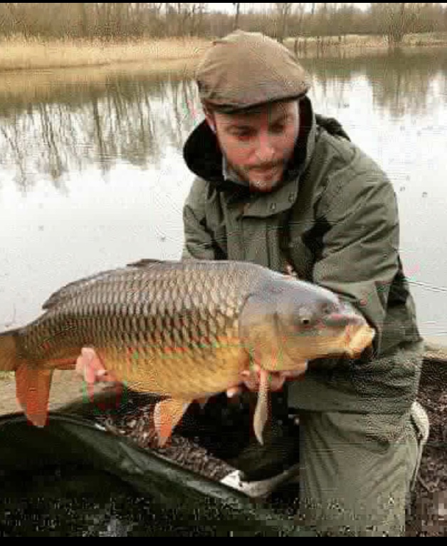 Lee French with one of three carp landed on Becks Lake. 